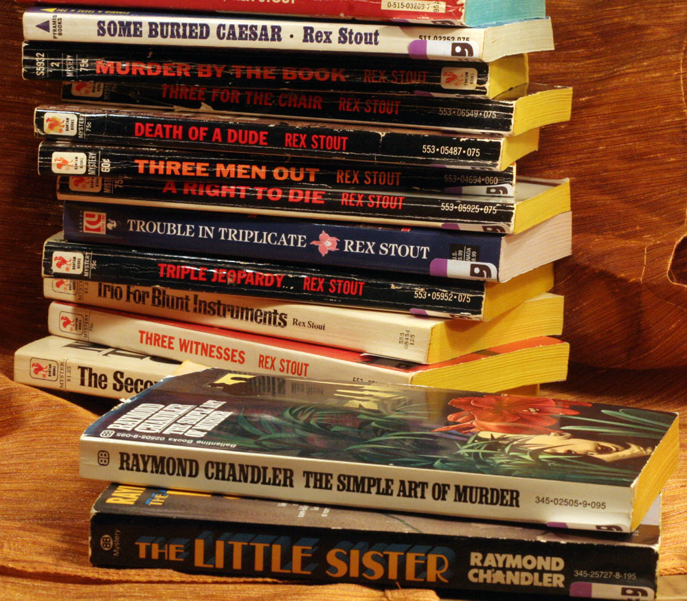 I've finally cracked open this stack of paperbacks I picked up a couple of months ago. I think I now have every Rex Stout that exists (this pile is about 20 books high, it just didn't fit in the FOV.) I need the pair of Raymond Chandlers just so I can get a break from the onslaught of Archie and Nero.